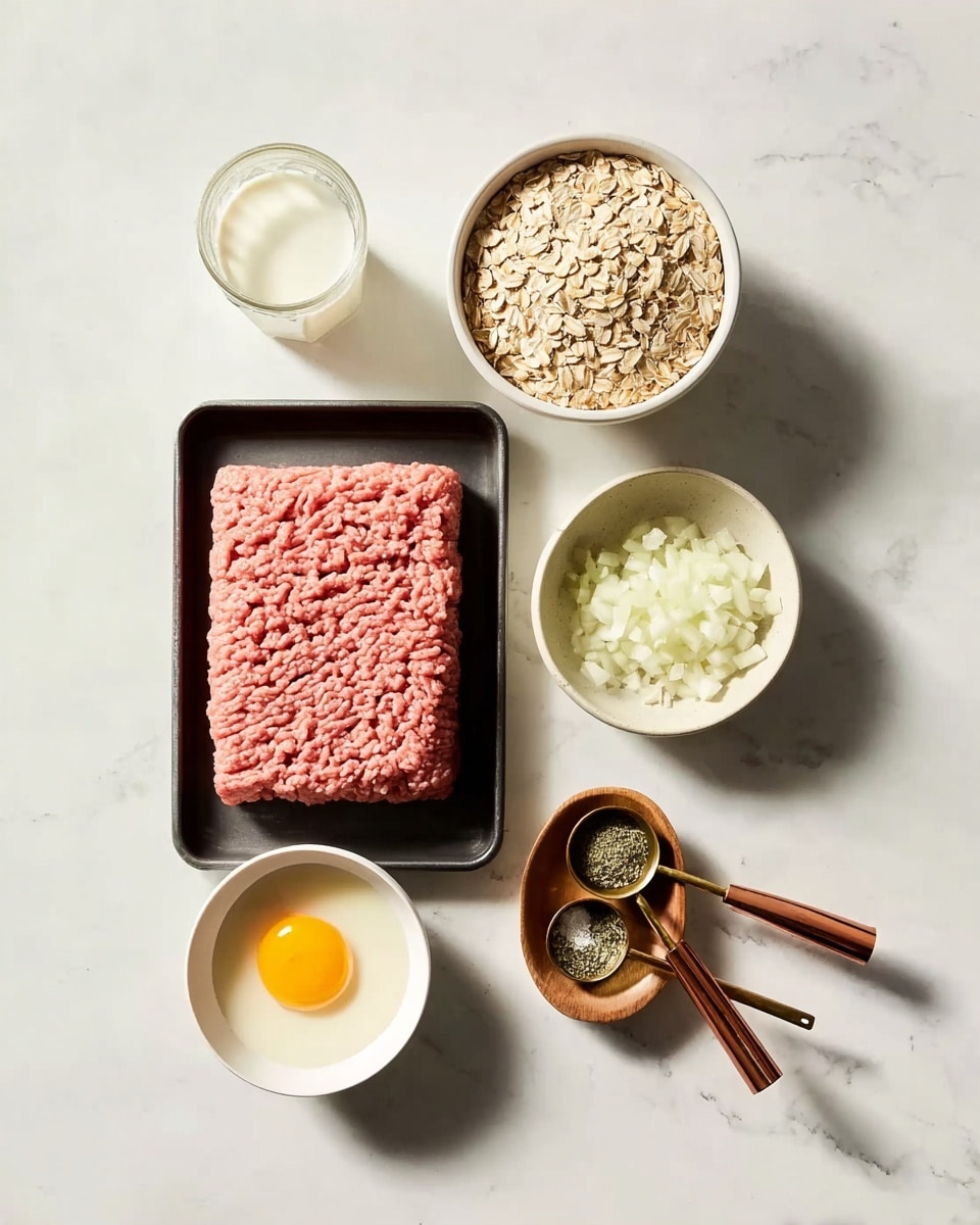 A flat black tray holds a large square of pink ground meat with a textured surface, placed on a white marbled background. Above the tray, a white bowl is filled with beige rolled oats, and next to it, a clear glass with white milk inside shows reflections of light. Below the oats and milk, a small white bowl contains a single raw egg with a bright yellow yolk and clear egg white. To the right of the egg bowl, a small white bowl is filled with chopped white onions with a slightly wet look. Below the onions, a small round wooden bowl contains a mix of white salt and green herbs. Tied together with the bowls are three gold-colored measuring spoons with brown leather handles arranged in a fan shape, casting shadows on the surface. Photo taken with an iphone --ar 4:5 --v 7