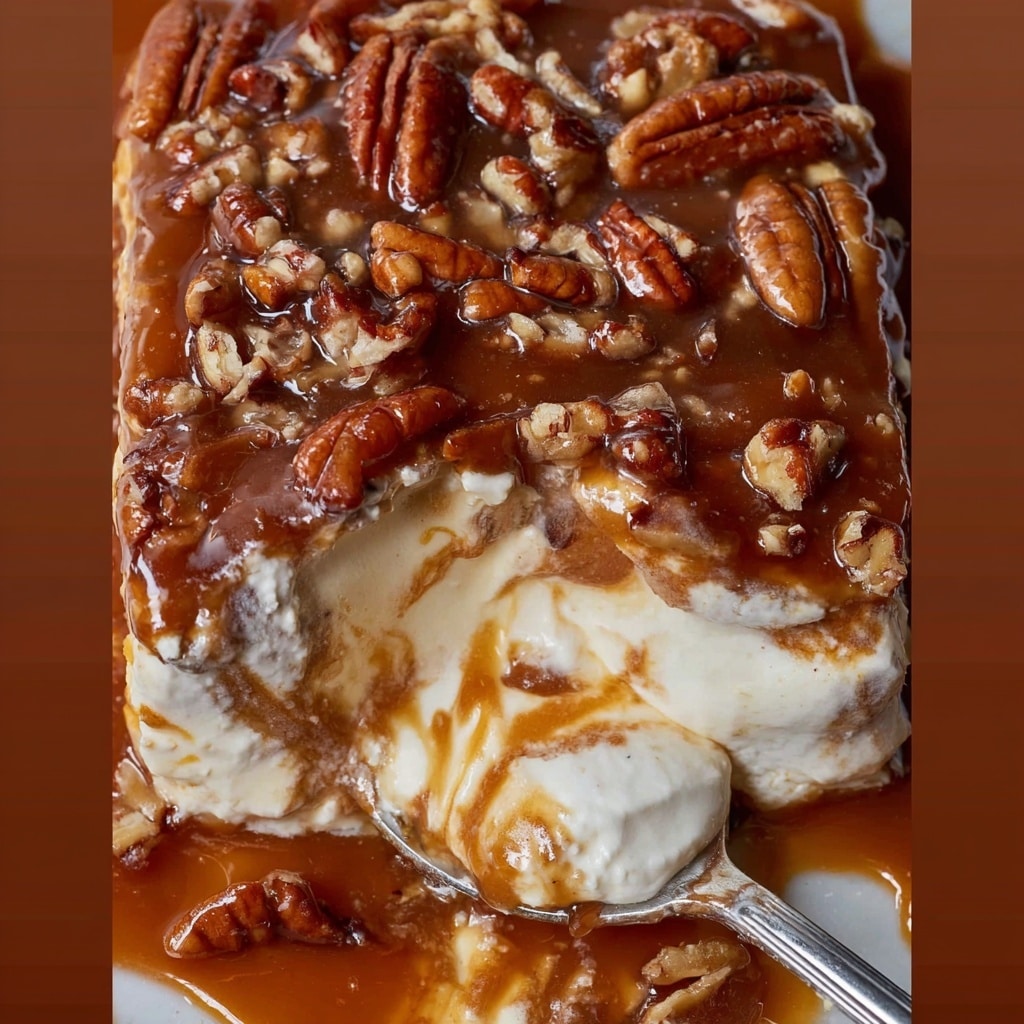 A decadent dessert with three visible layers: the top layer is a glossy, deep caramel-brown sauce, speckled with abundant, roughly chopped pecans for a crunchy texture; below that is a thick, creamy off-white layer with rich swirls of caramel color throughout, creating a marbled effect; the spoon reveals the bottom layer which appears to be even more velvety and pale, possibly a base of whipped or mousse-like consistency, blending slightly with the caramel above. The overall look is gooey and luscious, with the contrast of gooey caramel, creamy filling, and nutty toppings. photo taken with an iphone --v 7.0