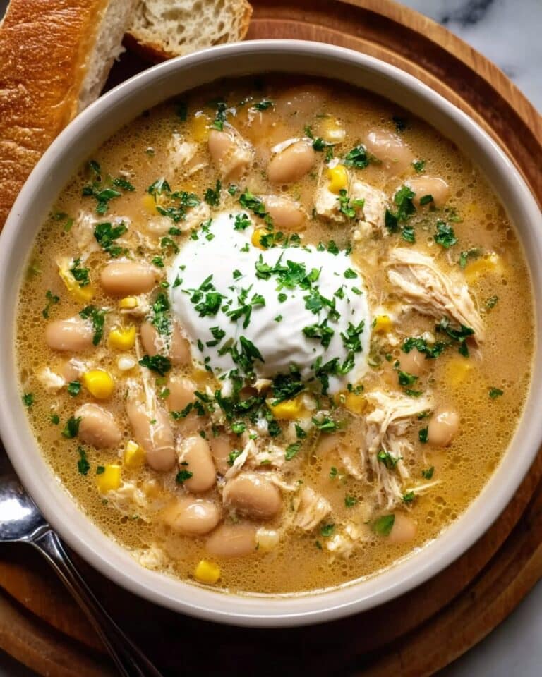 Creamy White Chicken Chili with Beans, Green Chilies, and Cheese Recipe