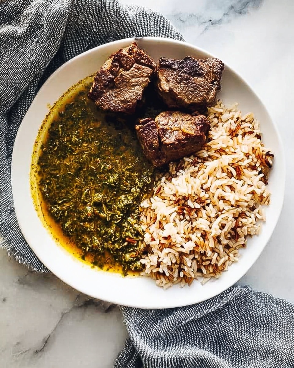 A white round plate on a white marbled surface holds a meal with three clear sections: on the left, there is a thick, greenish stew with a slightly watery texture spreading in a semi-circle; on the top side are two pieces of browned, grilled meat placed close together, showing a crispy texture; on the right side is a mound of brown and white rice with a fluffy, separated grain appearance. A grey cloth with visible woven texture is draped around the plate edges. photo taken with an iphone --ar 4:5 --v 7