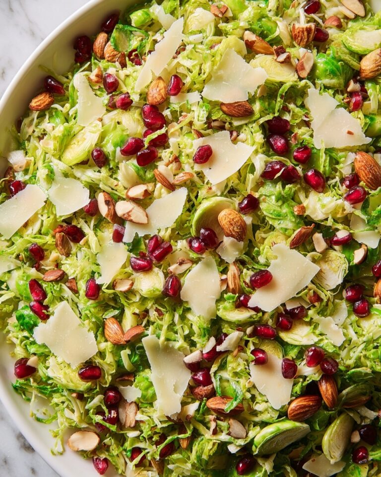 Brussels Sprout Salad with Lemon, Pomegranate, and Toasted Almonds Recipe